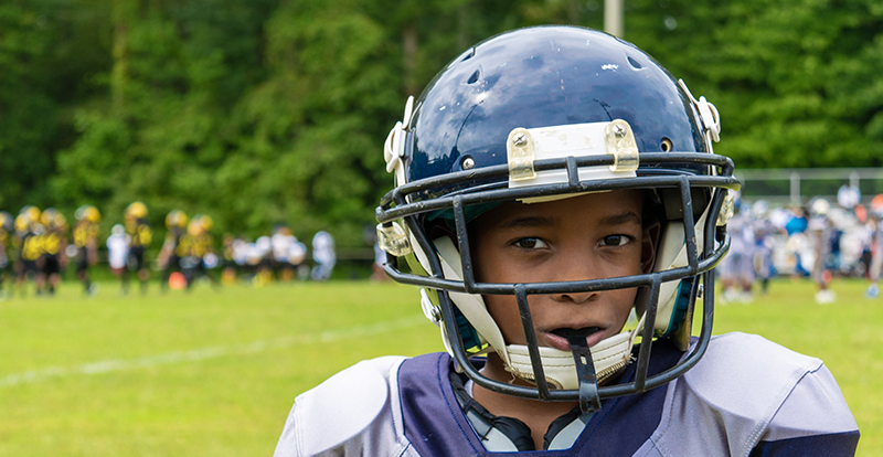 Football Helmet Safety 101: How to Help Children Avoid Football Injuries